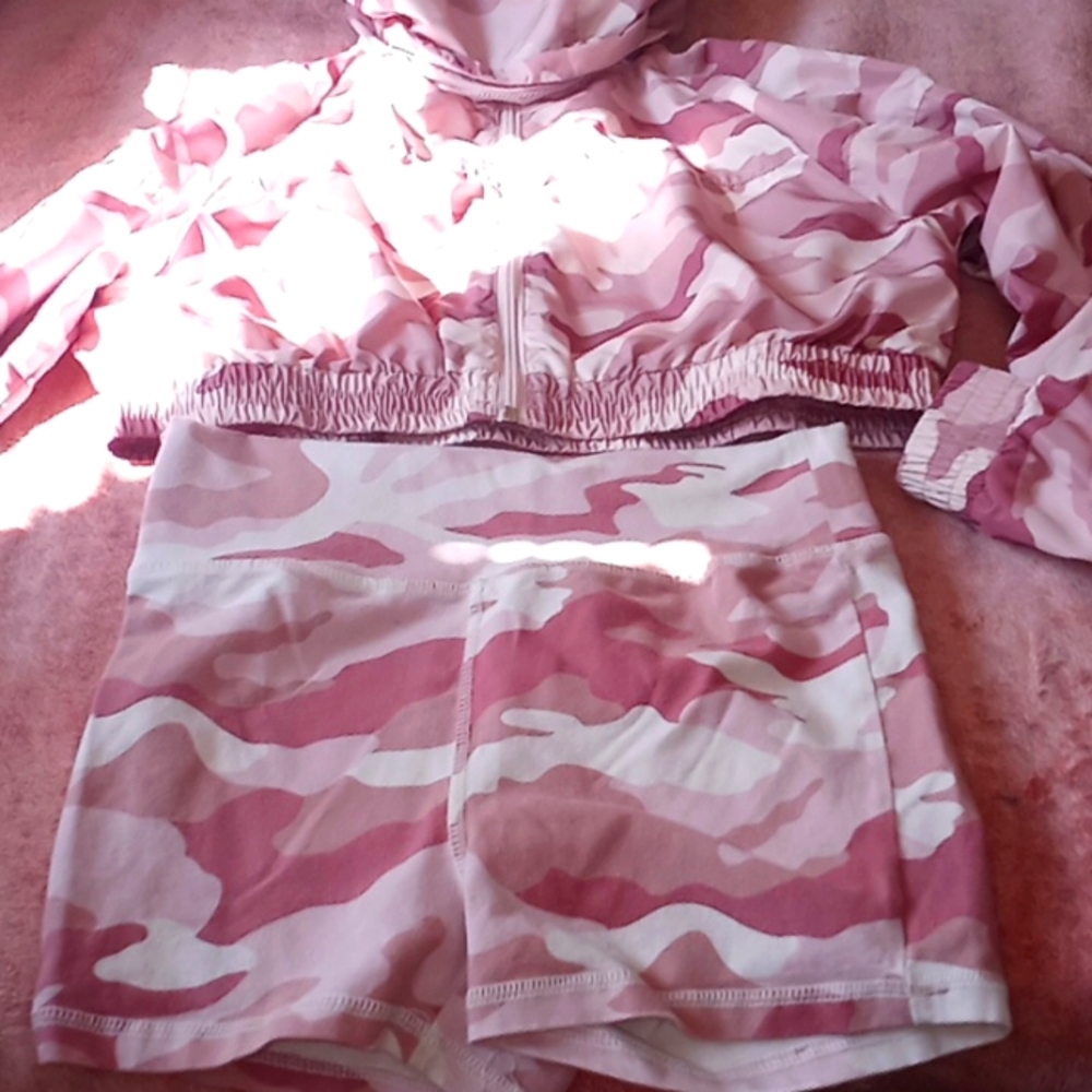 This is a two piece camo outfit the size is a extra small